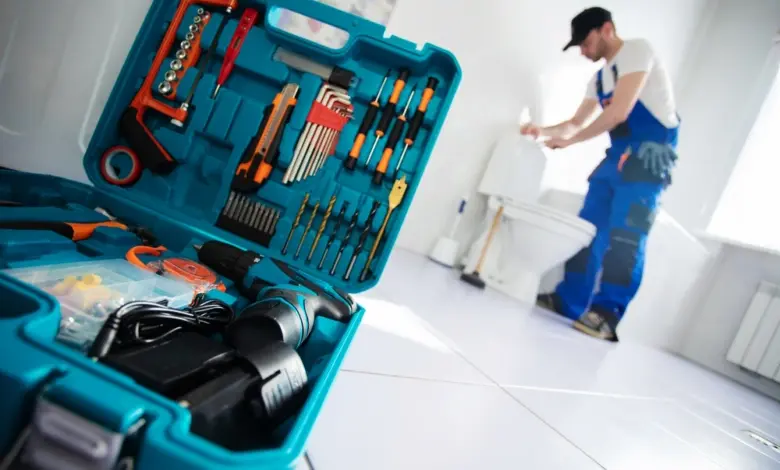 Plumber with toolbox