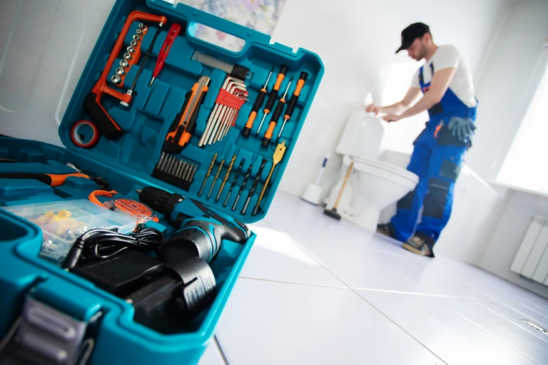 Plumber with toolbox