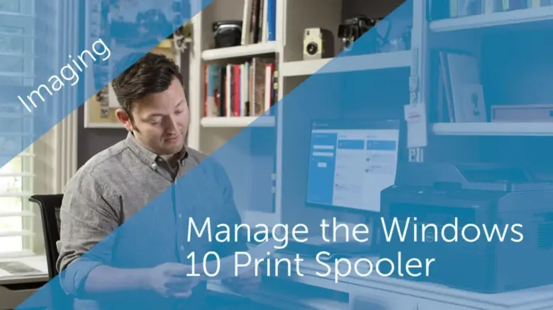 Man at computer with printer