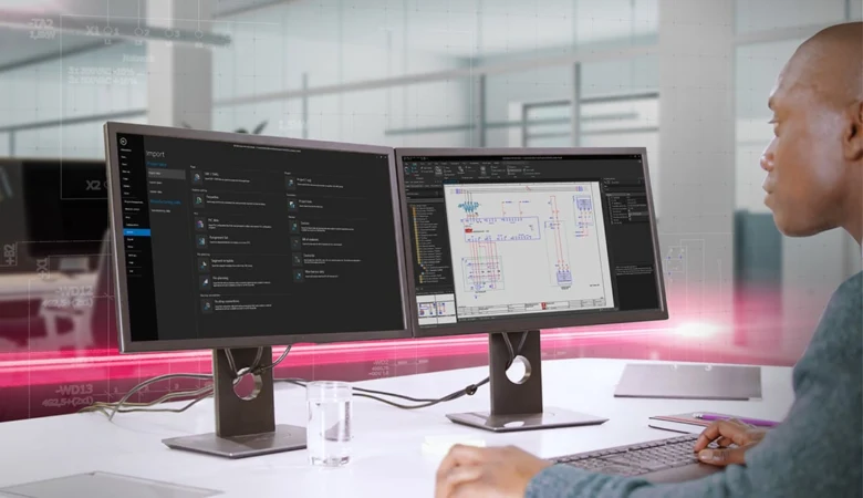Inženýr kreslí elektrický obvod na počítači s CAD programem.
