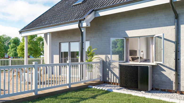 House exterior with heat pump unit