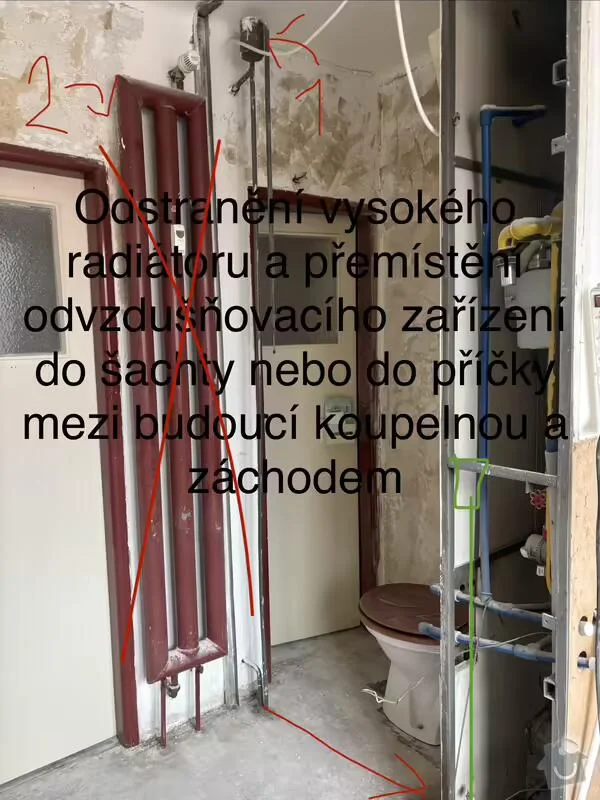 Starý radiátor se odstraňuje při rekonstrukci koupelny s novými potrubími.