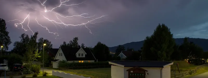 Lightning strike over houses
