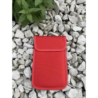 Red pouch on gravel